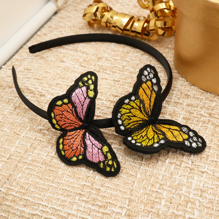 Haarreif "Papillon" aus Satin mit zwei gestickten Schmetterlingen in Rosa und Gelb