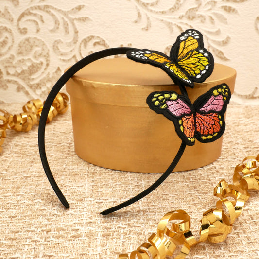 Haarreif "Papillon" aus Satin mit zwei gestickten Schmetterlingen in Rosa und Gelb